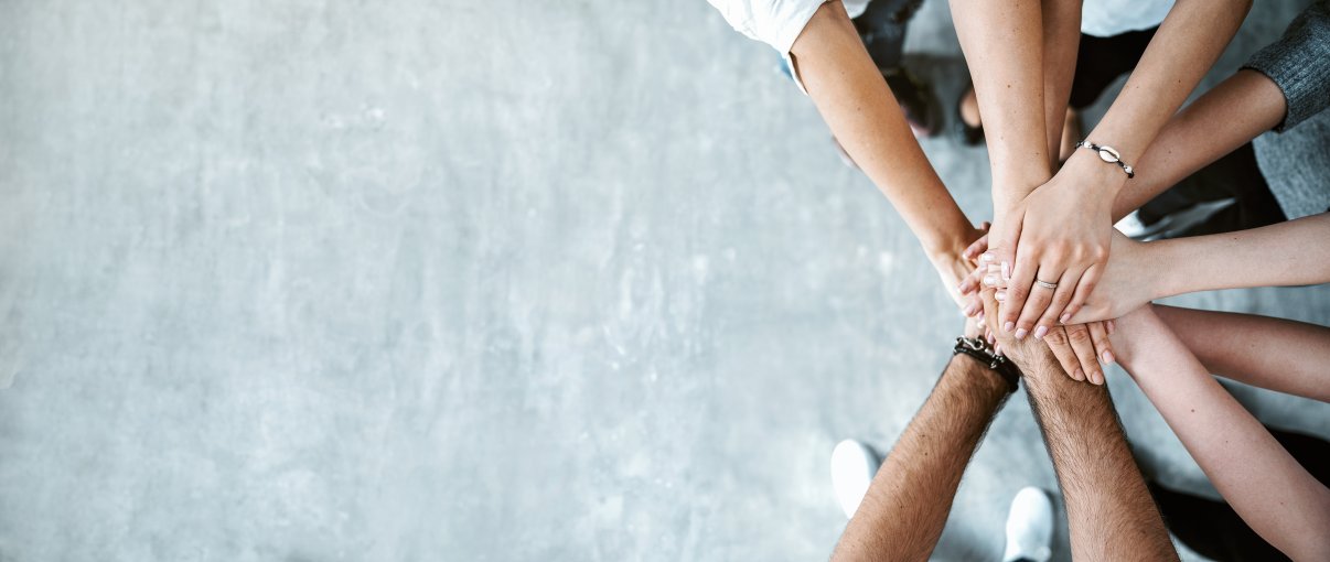 Hands together for teamwork