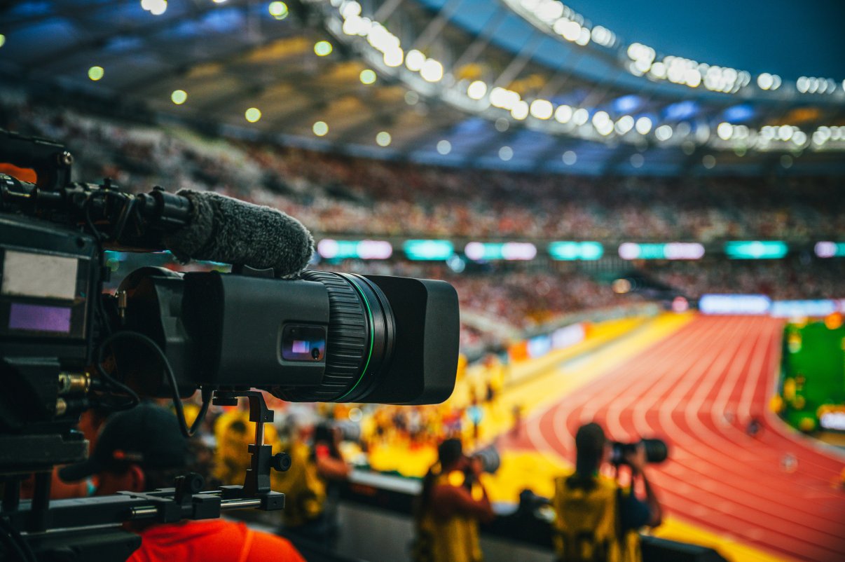Camera on track and field stadium