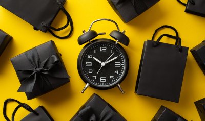 Black Friday black shopping bags and clock