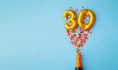 Bottle of champagne and balloons mark the 30th anniversary of the European Single Market