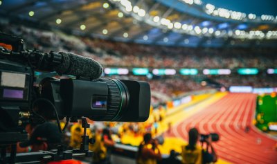 Camera on track and field stadium